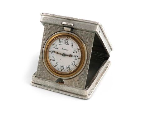 A silver travelling clock,by William Base and Sons, Birmingham 1923,hinged rectangular form, engine-turned decoration, foliat