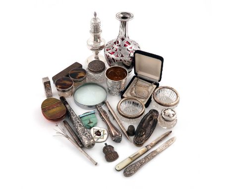 λ λA mixed lot,comprising silver and metalware items: a George III caster, London 1788, two silver-mounted tortoiseshell toil