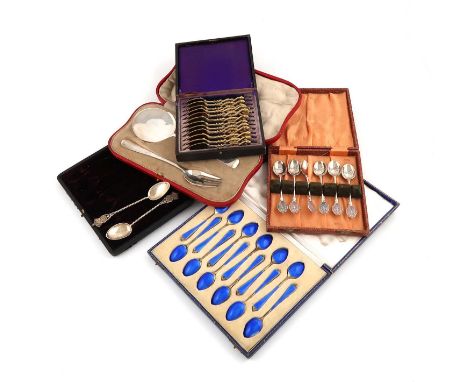 A set of twelve silver-gilt and blue enamel coffee spoons,by the Adie Brothers, Birmingham 1931, in a fitted case, plus an eg