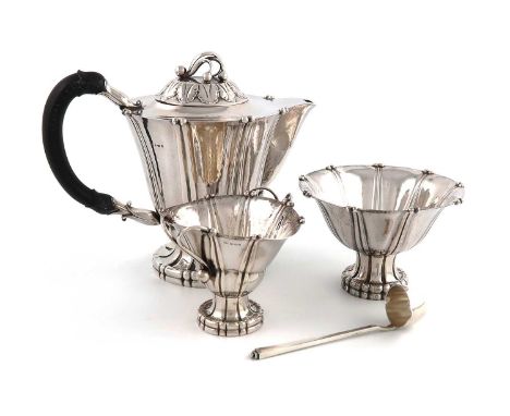 please note: the cream jug does not have import marks.By Georg Jensen, a three-piece Danish silver tea set,design number 4A, 