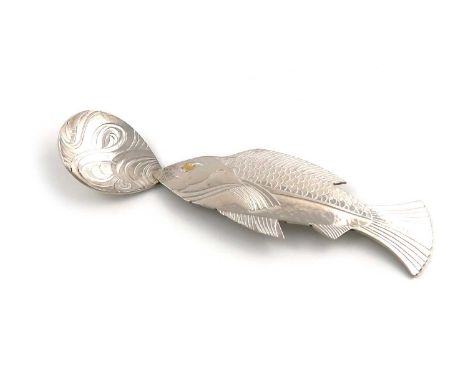 By Rod Kelly, a modern silver caddy spoon, London 2014,the handle modelled as a fish, chased scales, gilded eye, the fig-shap