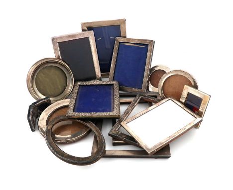 A mixed lot of silver frames,various dates and makers,various designs, some lacking easel backs and glass. (qty)