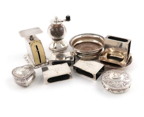 A mixed lot of silver items,comprising: a silver and bakelite postal scale by Levi &amp; Salaman 1906, a silver pepper mill b