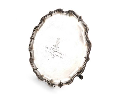 A presentation silver salver,by Mappin &amp; Webb Ltd, Sheffield 1934,circular form, moulded border, the centre with a presen