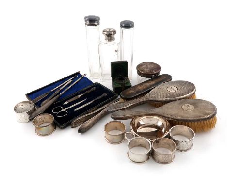 A mixed lot of silver items,various dates and makers,comprising: a wine taster, London 1966, a cased manicure set, three brus