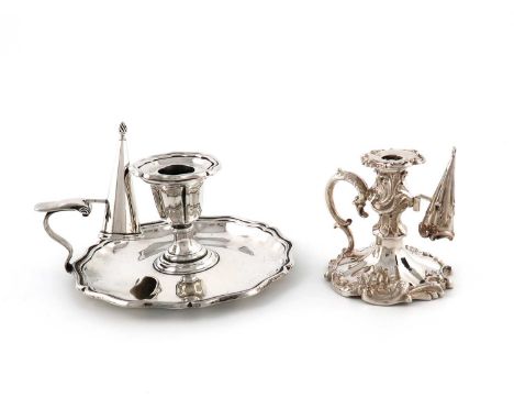An Edwardian silver chamberstick,by Thomas Bradbury, London 1901,shaped circular form, scroll handle, detachable drip pan and
