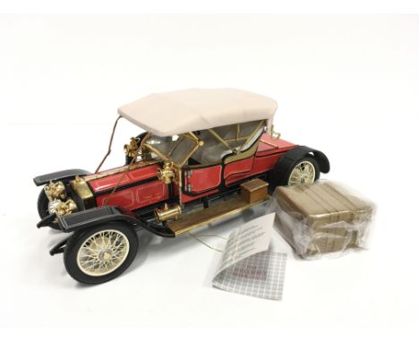 Franklin Mint 1/24 scale 1910 Rolls-Royce Balloon Roadster. Appears E, small faint mark to canopy, boxed with certificate and