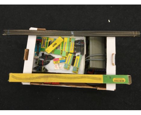 A quantity of TRIX and PECO N Gauge Track, an H&M Duette Controller and 2 x Playcraft Electric Point Controllers including 8 
