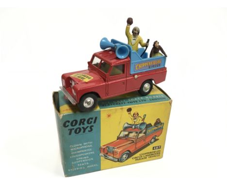 Corgi Toys 487 Chipperfields Circus Land Rover Parade Vehicle with 'CIRCUS IS HERE' label, chimpanzee and clown. VG in G box 