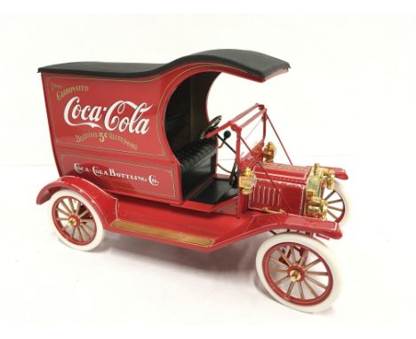 Franklin Mint 1/16 scale Coca Cola Model T Delivery Truck, accented with 22 carat gold. Appears E/M and boxed with certificat