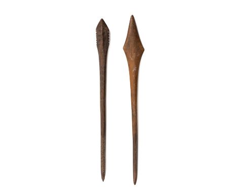 TWO ABORIGINAL FIGHTING CLUBS, probably Southeast Australia, one of rare form with serrated triangular section head, lightly 