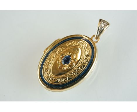 Sapphire and diamond enamelled 14ct yellow and white gold set locket pendant, oval mixed cut blue sapphire to the centre meas