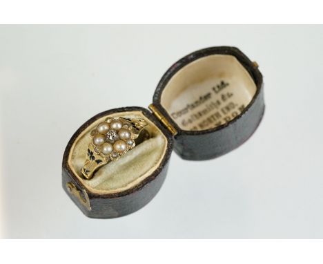 Early Victorian diamond and pearl 18ct yellow gold flower head mourning ring, small old cut diamond to the centre, six split 