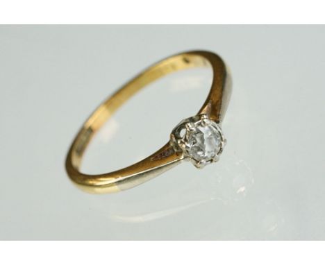 Diamond solitaire 18ct yellow gold and platinum set ring, the round old cut diamond weighing approx 0.20 carat, rubover claw 