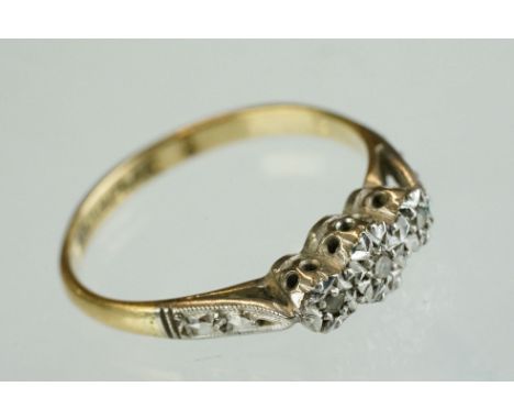 Diamond 18ct yellow gold and platinum set three stone ring, three small illusion set diamonds, ring size K½ 