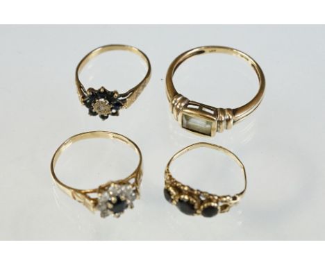 Four gem and paste set 9ct yellow gold dress rings to include sapphire and diamond flower head cluster ring (4) 