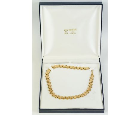 Yellow metal fancy link collar necklace, articulated links, bolt ring clasp, length approx 47cm, clasp indistinctly stamped 