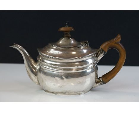 Edwardian silver bachelors teapot, of boat-shaped form, with scrolling fruitwood handle &amp; finial, London 1906, C S Harris