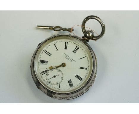 Late Victorian silver open face key wind pocket watch, English Lever, Bennett Plymouth, white enamel dial and seconds dial, b