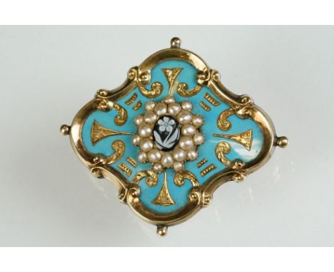 19th century black onyx, seed pearl, enamelled yellow metal mourning brooch, the black onyx cameo to the centre carved as a f