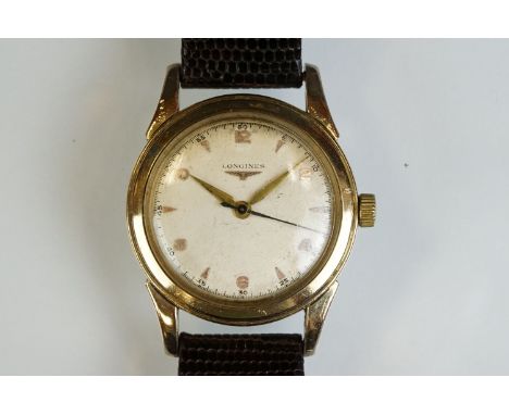 Gents Longines 34mm manual wind watch.  Rose metal case, replacement case back, replacement strap 