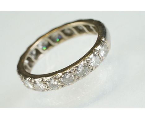 Diamond unmarked white gold full eternity ring, seventeen round brilliant cut diamonds, each weighing approx 0.10 carat, pavé