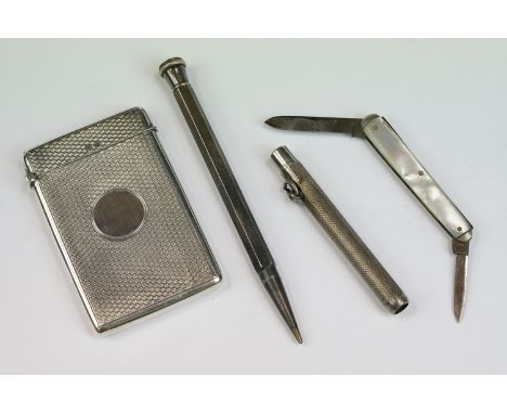 Early 20th Century silver card case with engine turned decoration, vacant cartouche, rectangular form, Birmingham 1910, maker