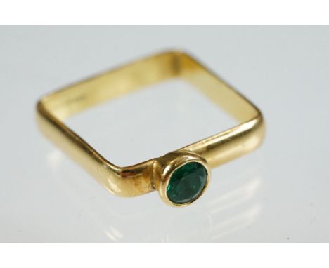 Emerald 18ct yellow gold ring, round mixed cut emerald diameter approx 5mm, rubover set, square shank, ring size approx Q½ 