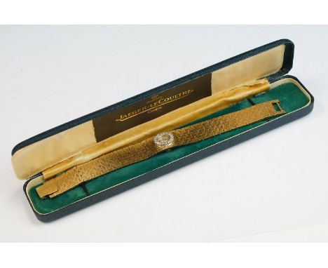 Jaeger-LeCoultre diamond 18ct yellow gold cocktail watch, champagne dial, round brilliant cut diamond surround, textured brac