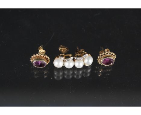 A pair of 9ct gold amethyst set earrings plus a pair of 9ct gold pearl set earrings