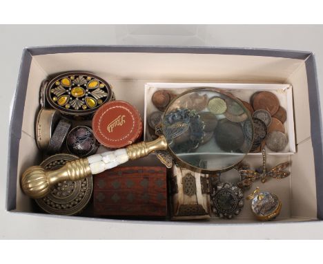 A brass and mother of pearl magnifying glass, coins and small sundries