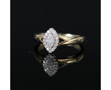 A 9ct gold diamond set ring in marquise shaped setting, size K