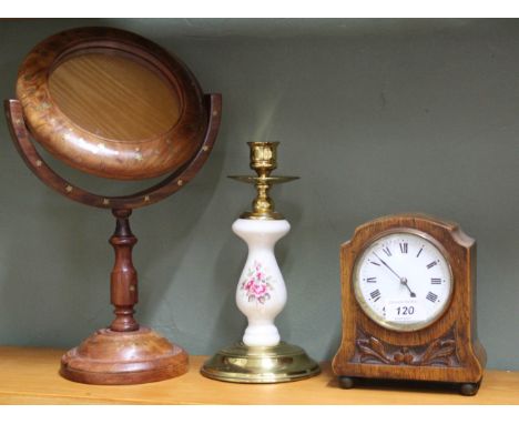 An oak mantel clock plus a brass and porcelain candlestick