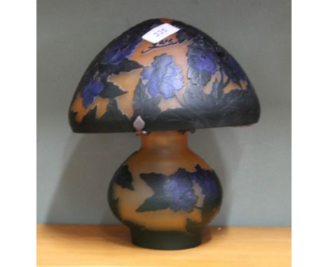 An amber and blue glass Galle style lamp
