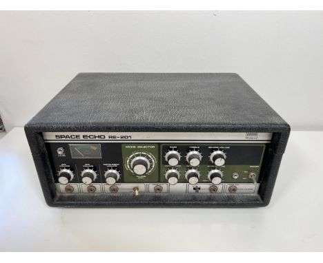 Roland RE-201 Space Echo for spares or repair. Seems to be complete but is very oxidised inside. The front panel is clean so 