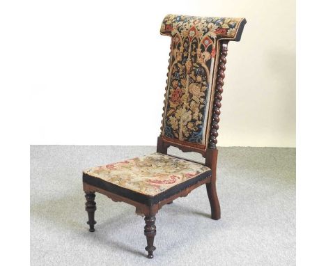 A Victorian rosewood prie dieu chair, with a tapestry seat and back47w x 56d x 107h cmCondition report: Overall looks to be c