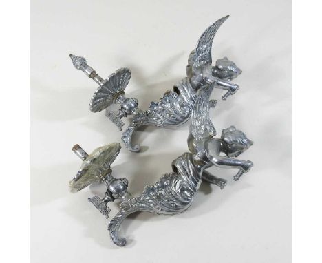 A pair of early 20th century nickel plated figural gas wall lights, in in the form of a winged lady, 23cm highCondition repor