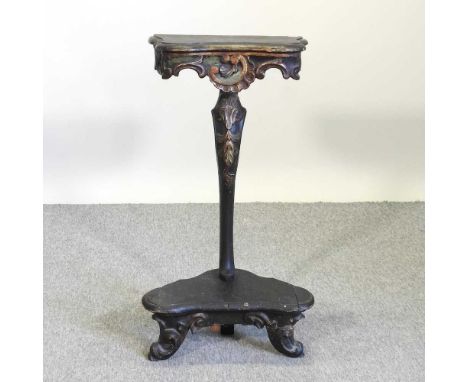 An 18th century Venetian console table, carved with scrolls, on a shaped base81cm highCondition report: Solid and usable but 