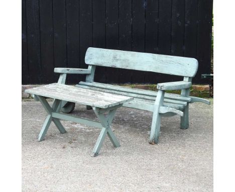 A green painted garden bench, 168cm, together with a garden table (2)