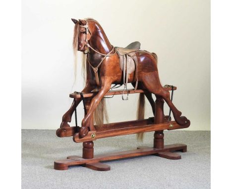 A 20th century carved hardwood rocking horse, by Robert Mullis, Swindon117h x 137cm overallCondition report: Overall conditio