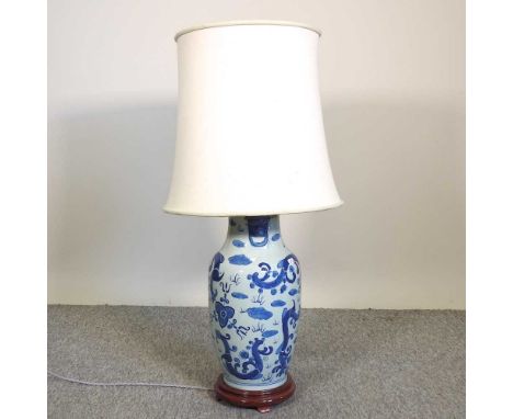 A large Chinese porcelain blue and white table lamp, and shade, 90cm high overall