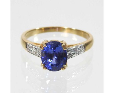 An 18 carat gold sapphire and diamond ring, 4g, size R, boxed with certificate