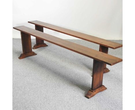 A 19th century fruitwood bench, on end supports, 200cm wide