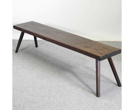 A 19th century walnut bench, on a splayed base168w x 36d x 54h cmCondition report: Looks to have been restored, so condition 