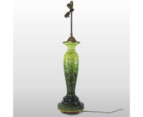 A large Burmantofts style green glazed table lamp, with impressed floral designs106cm high overallCondition report: Looks to 