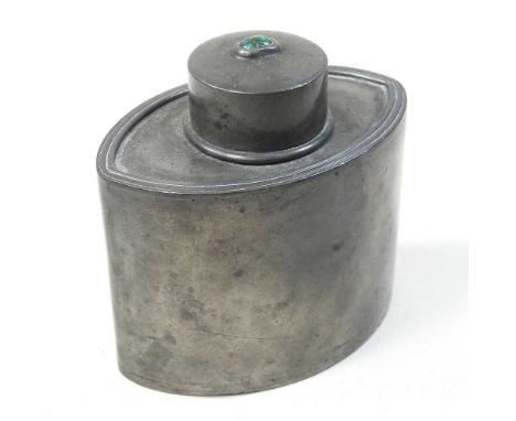 An Arts and Crafts pewter tea caddy, of oval form, by Liberty and Co, the cover having a central cabochon, impressed marks to