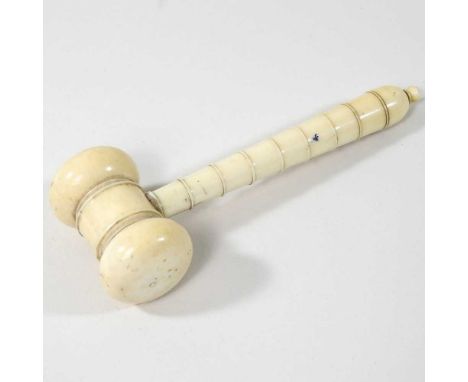 A 19th century ivory gavel, with a turned handle11cm long