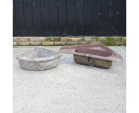 A cast iron feed trough, together with another (2)