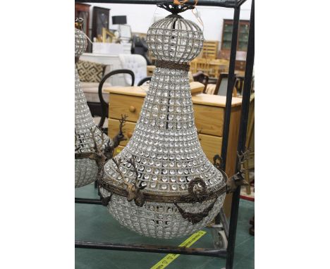 A ceiling light fitting decorated with stags