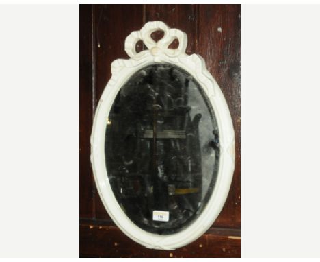 Oval bevelled edge mirror with ceramic frame 50 x 35 cm